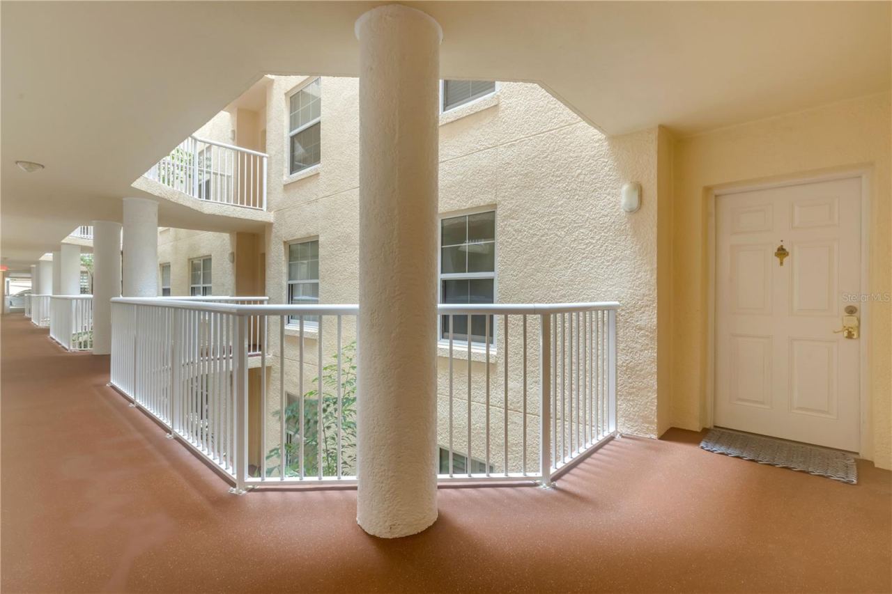 Photo 4 of 20: Walkway to Unit Door