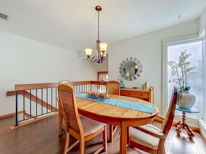 Photo 4 of 20: Dining Room with large picture window for natural ightng