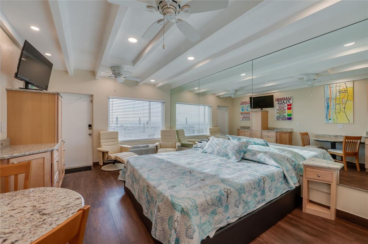 Photo 17 of 20: Well-appointed living area with easy access to the patio, blending indoor comfort with outdoor relaxation.