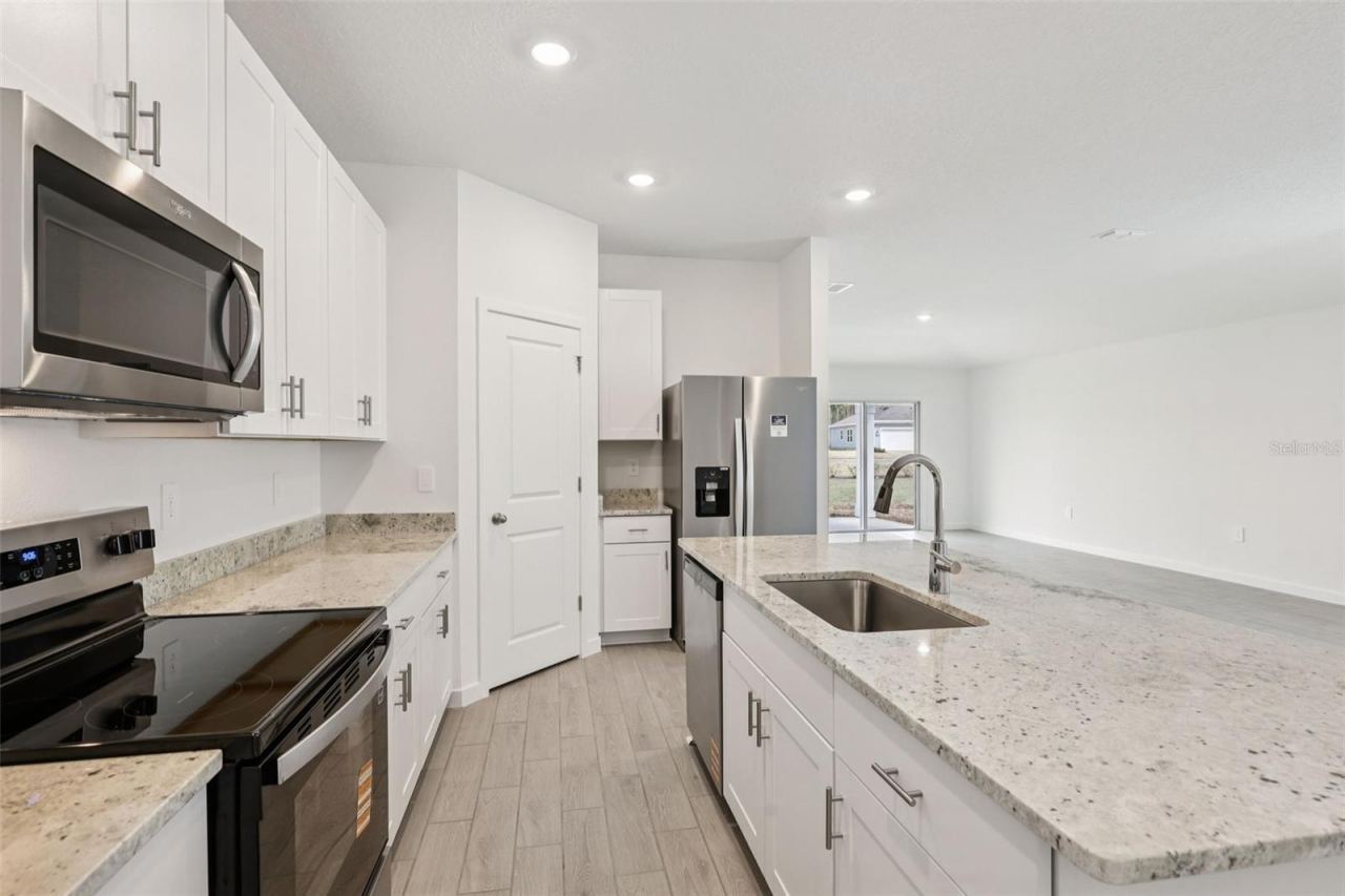 Photo 2 of 15: The interior photos are of another home with the same floor plan and interior finishes. Some details may vary
