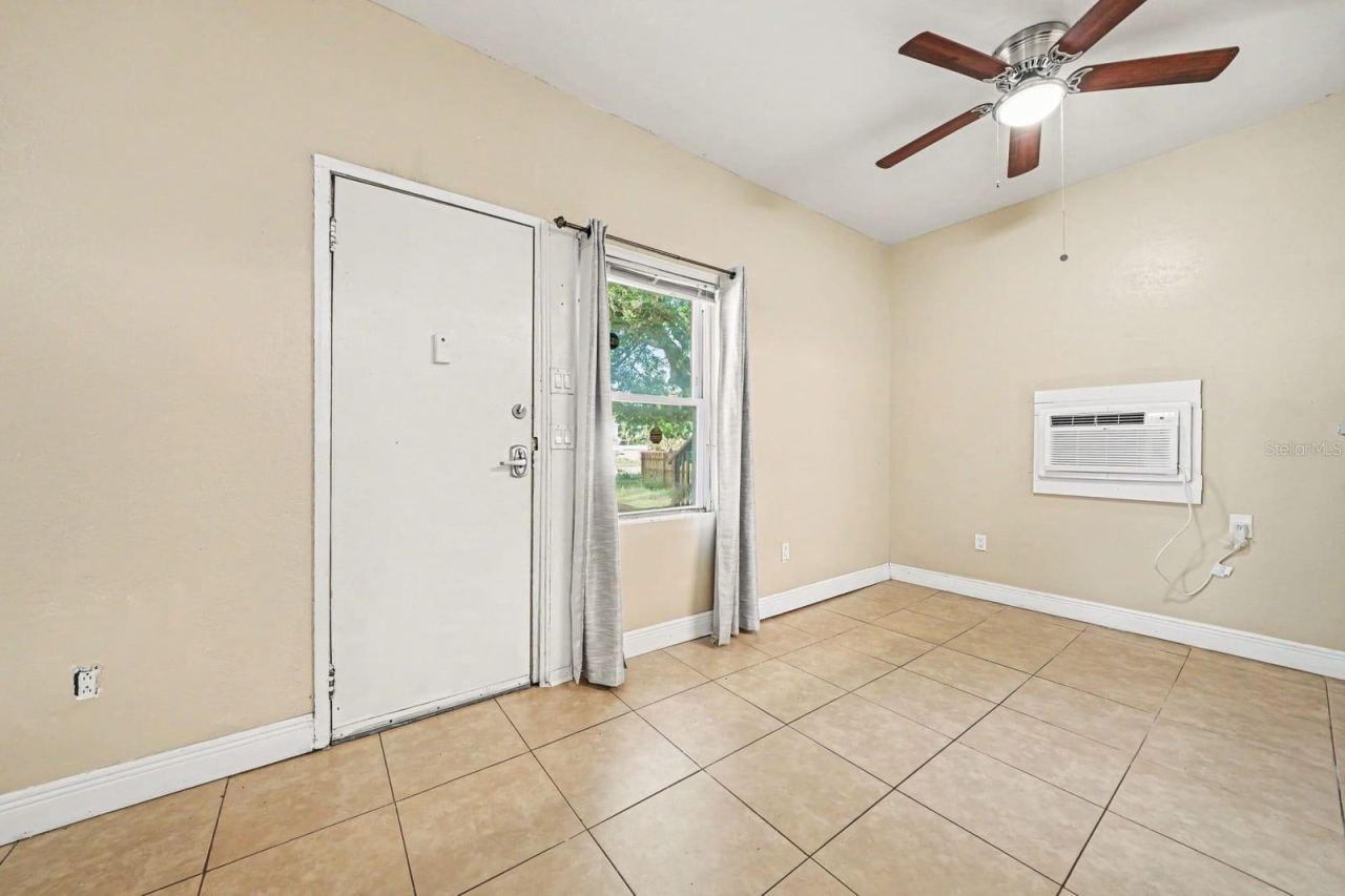Photo 6 of 20: Bright Living Space With Tile Flooring & Ceiling Fan