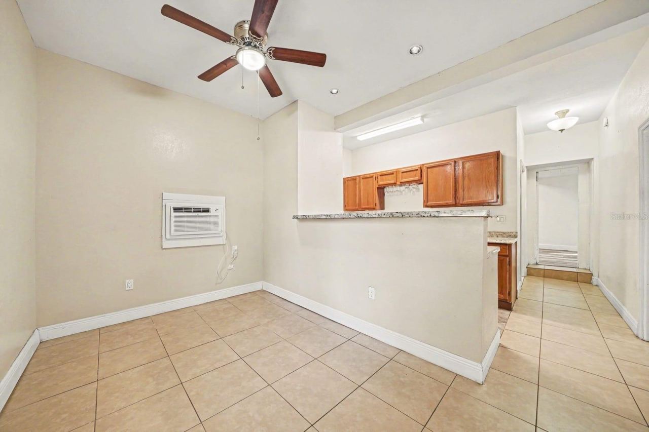 Photo 8 of 20: Spacious Dining Area With Kitchen Cabinets & Ceiling Fan