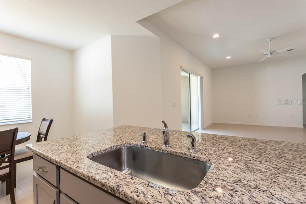 Photo 13 of 20: Kitchen island with granite countertop