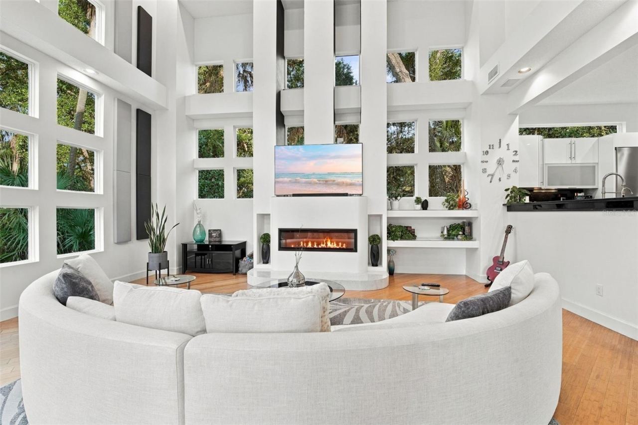 Photo 15 of 20: FAMILY ROOM | expansive glass, and a sophisticated interplay of indoor and outdoor spaces