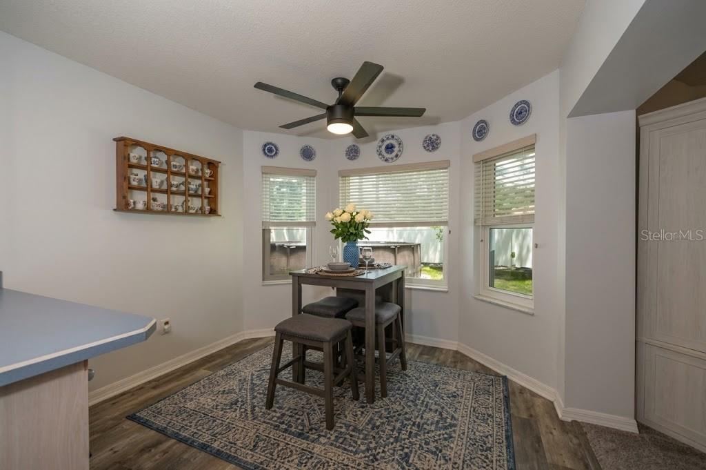 Photo 13 of 20: Breakfast Nook With A View Of The Beautiful Fenced In Private Backyard
