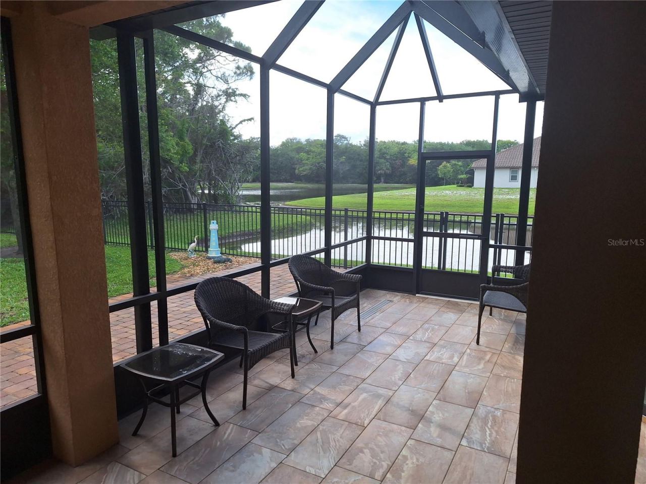 Photo 12 of 20: Lanai screened tiled
