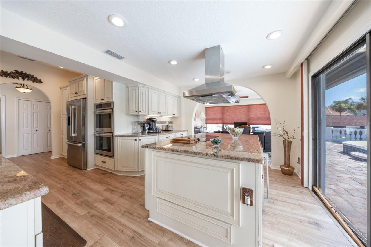 Photo 12 of 20: Island with cooktop and hood exhaust