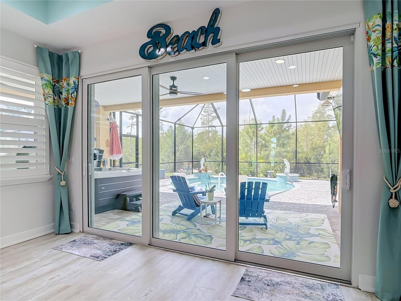 Photo 8 of 20: View of Pool from Living Room
