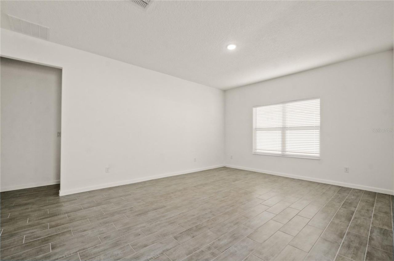 Photo 14 of 20: View of living room from dining area.