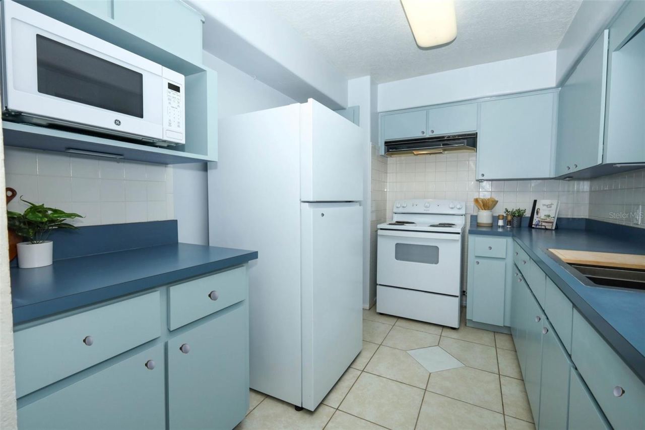 Photo 7 of 20: Kitchen with brand new black round knobs finished after photos