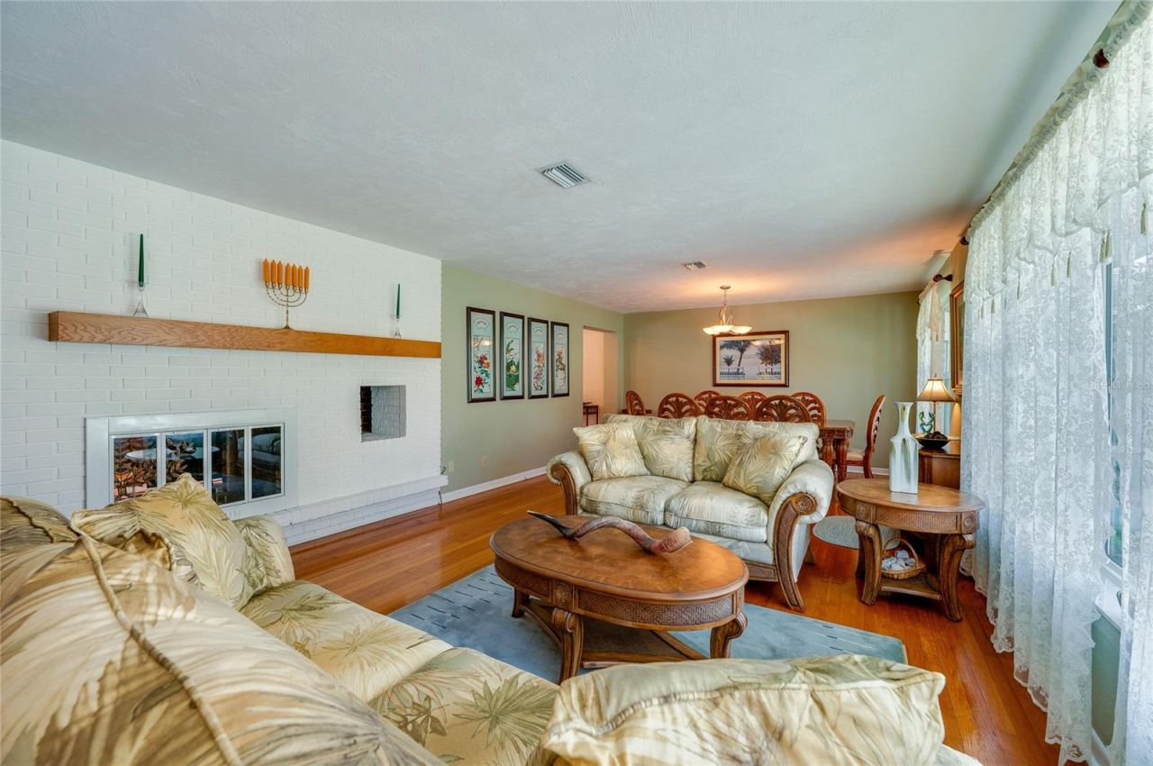 Photo 7 of 20: Living room with double-sided fireplace