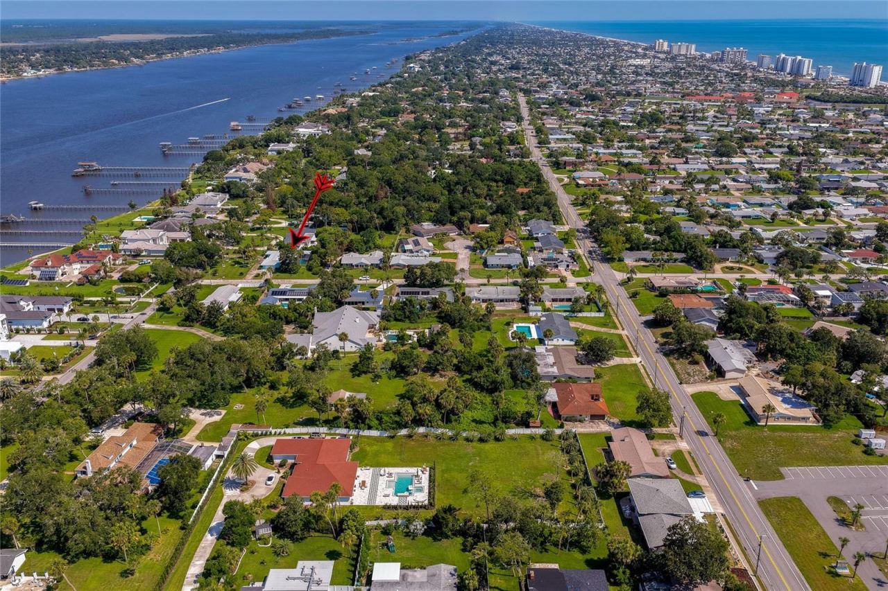 Photo 2 of 20: Live where others vacation! River to the west; beach to the east.