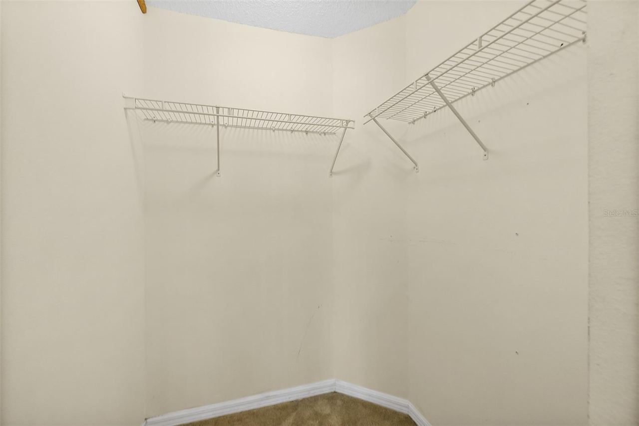 Photo 18 of 20: Primary Walk in Closet