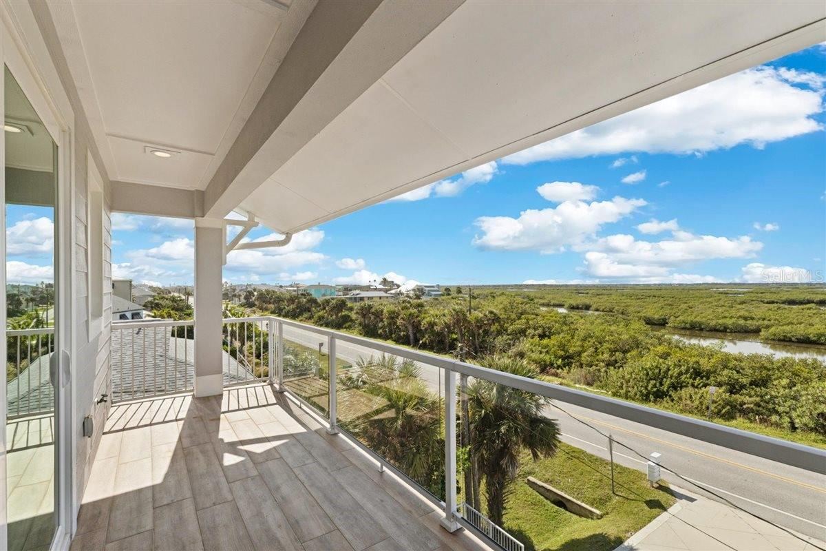 Photo 15 of 20: 3rd Floor balcony with glass rails