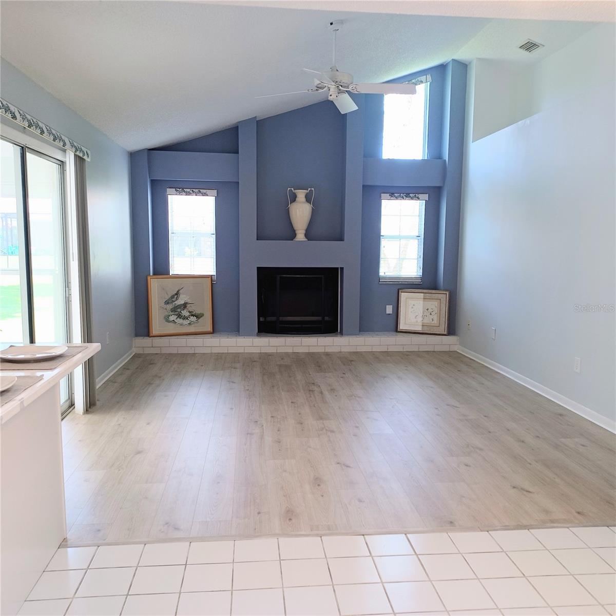 Photo 9 of 20: Family Room. Sliders go to big Florida Room