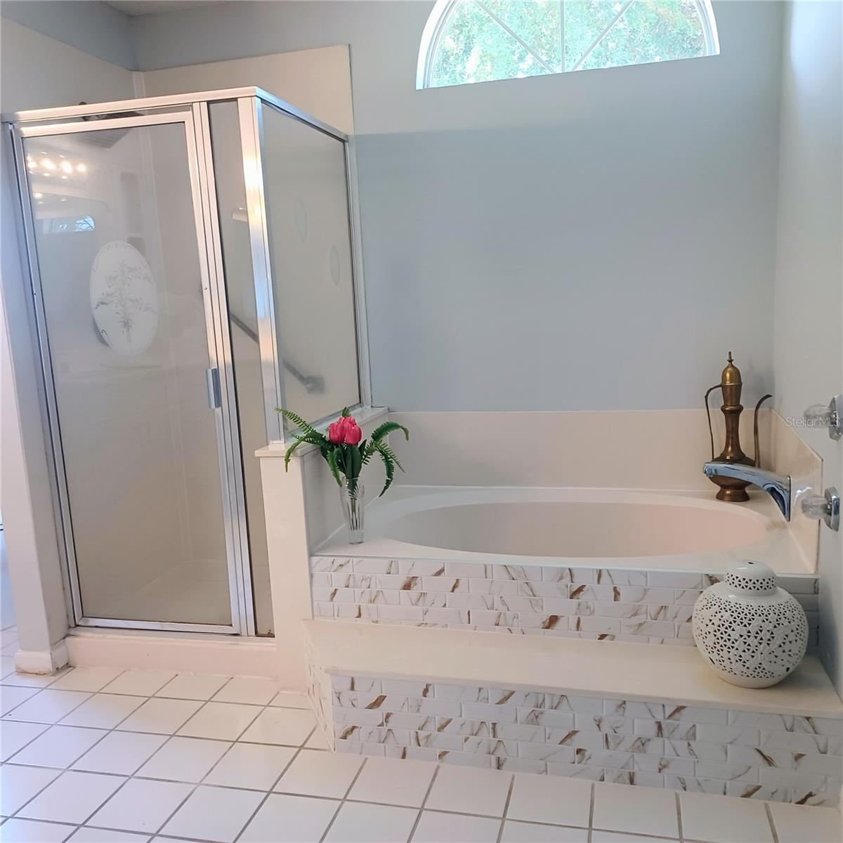 Photo 12 of 20: Primary soaking tub and shower