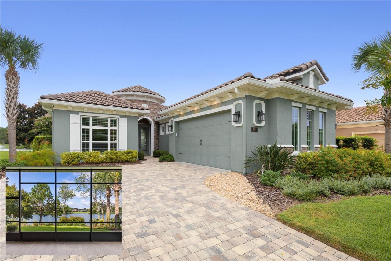 Photo 1 of 20: Attractive Curb appeal with Coastal Green Exterior & white trim