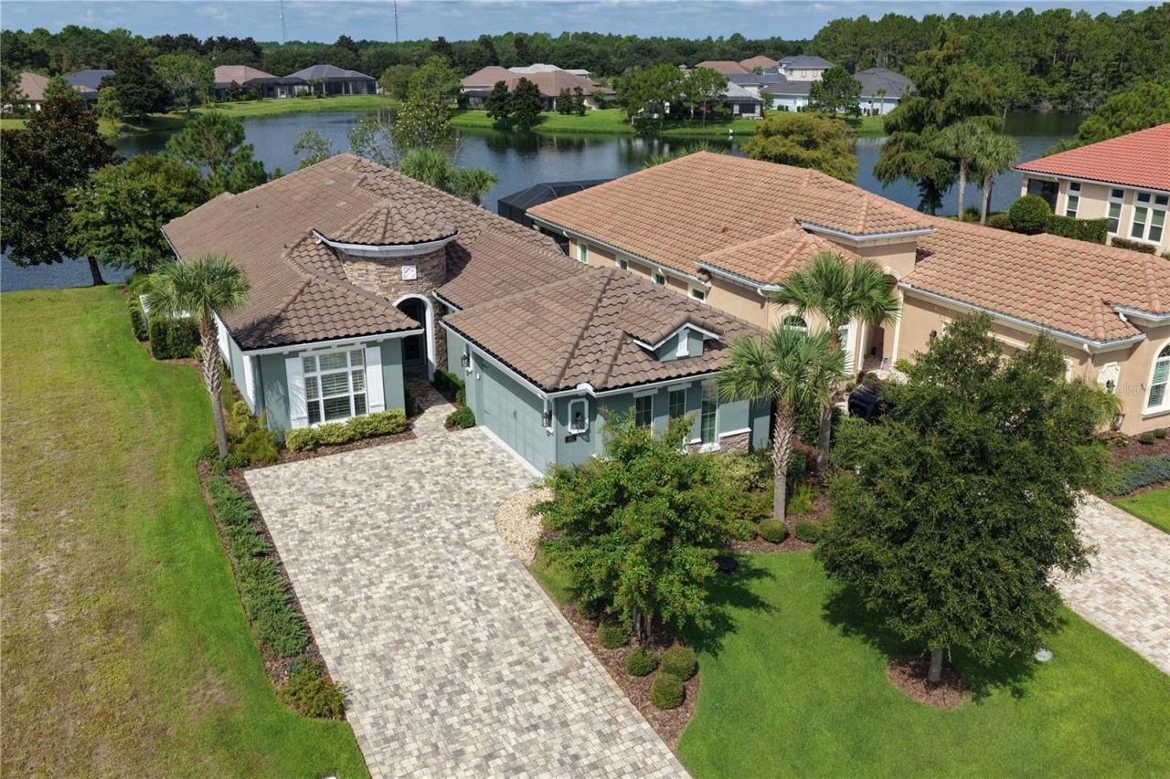 Photo 10 of 20: Lakefront & rare neighbor house side lot for breathing room between houses.