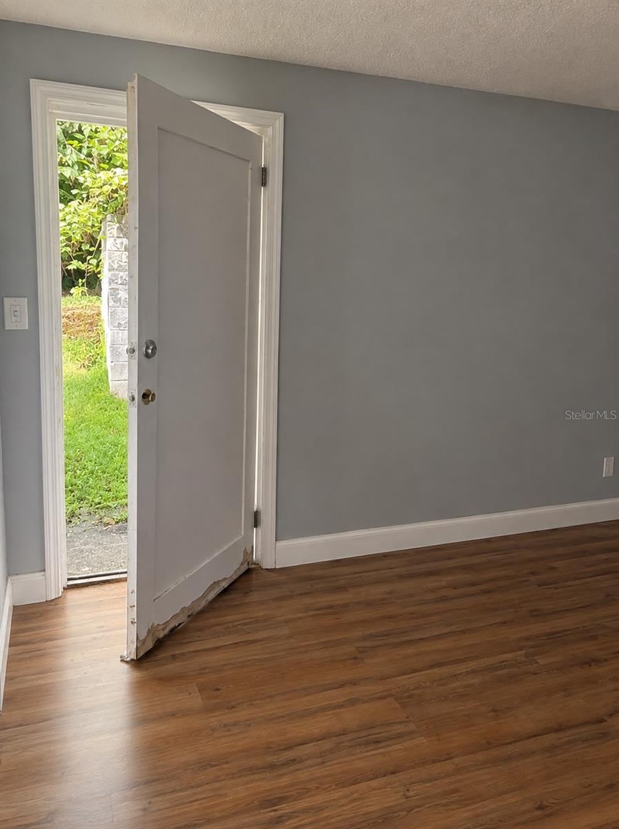 Photo 10 of 15: door to backyard (from bedroom #3)