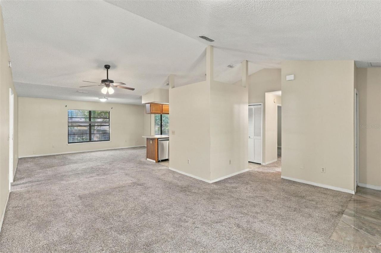 Photo 4 of 20: Living Room to Dinning Room and Kitchen