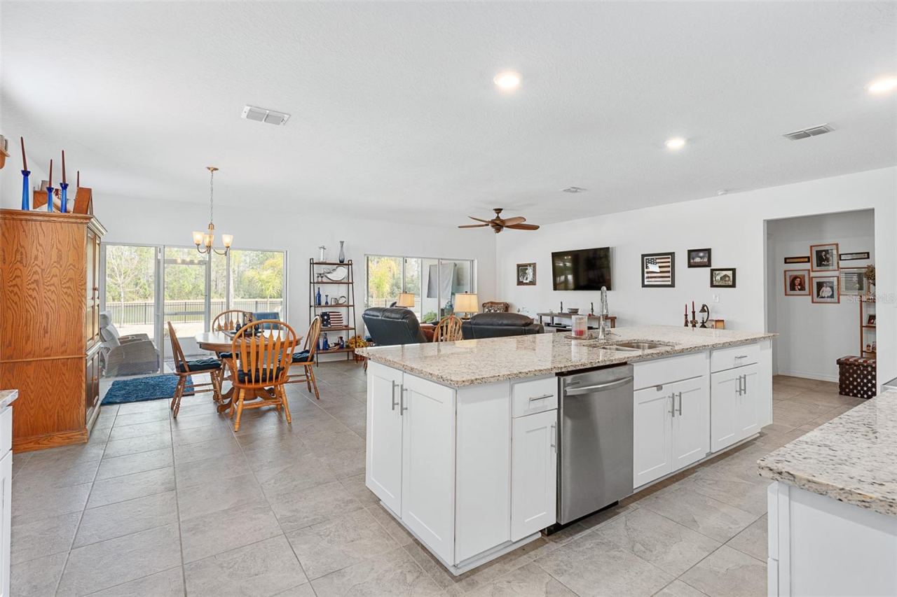 Photo 11 of 20: Kitchen Opens to Dining Room