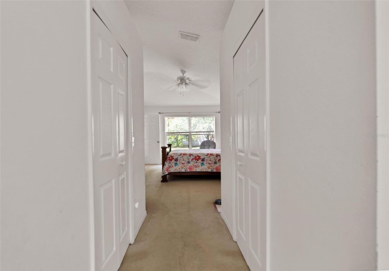 Photo 17 of 20: Hallway in primary bedroom from Bathroom