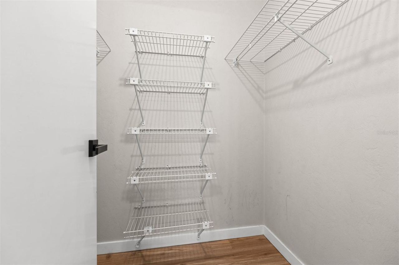 Photo 19 of 20: Primary Walk-In Closet