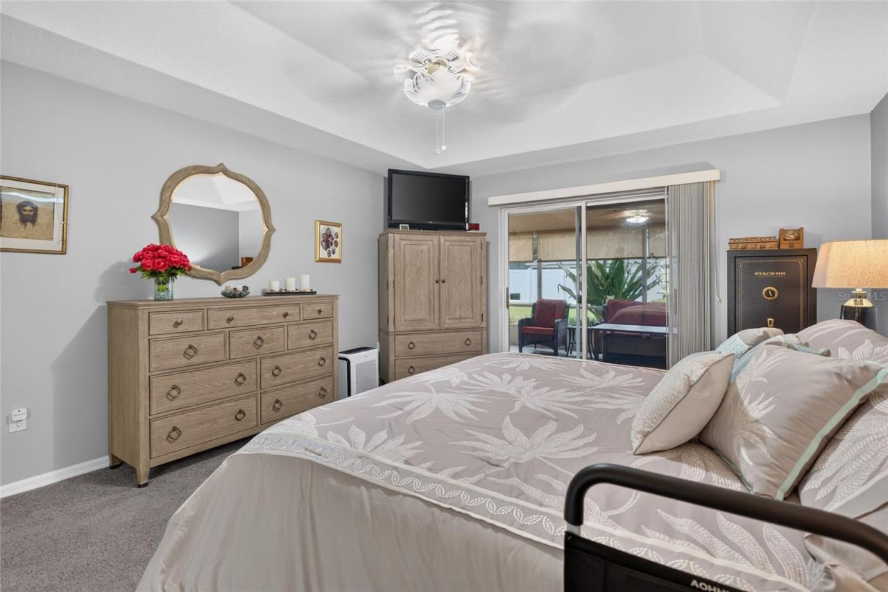 Photo 19 of 20: Primary Bedroom with direct sunroom access