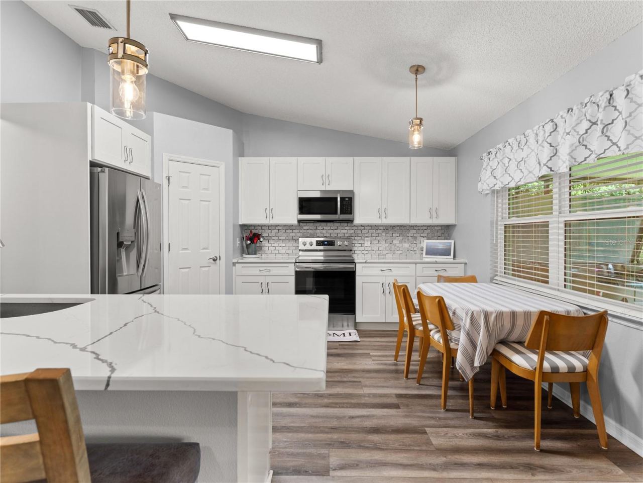 Photo 5 of 20: Updated kitchen with quartz countertops