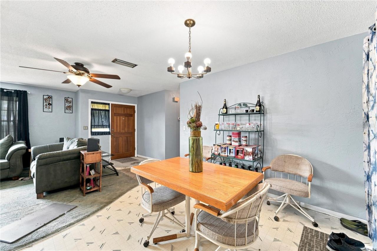 Photo 4 of 16: Dedicated dining space connects the main living areas and offers room to gather.