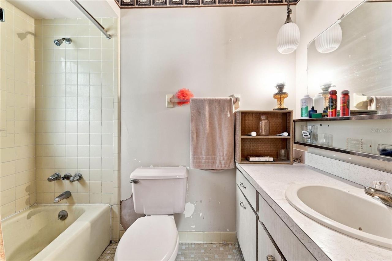 Photo 9 of 16: Primary bath—one of TWO full bathrooms in the home
