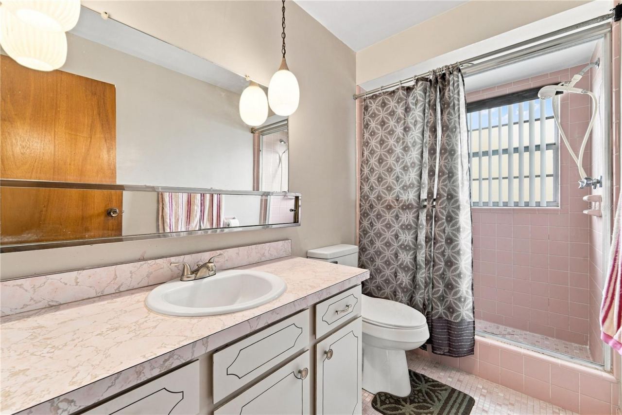 Photo 11 of 16: A second full bathroom adds valuable functionality to this 2-bedroom home.