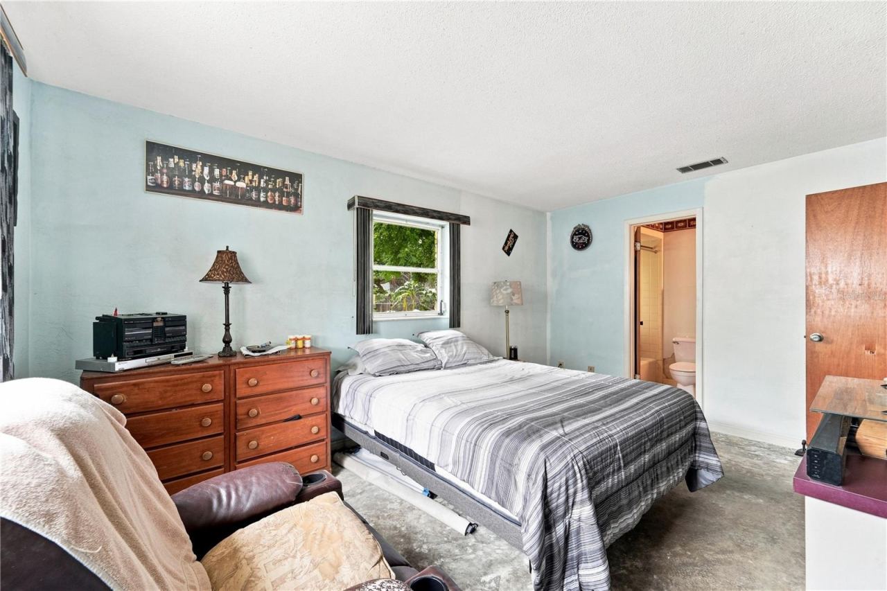 Photo 7 of 16: Comfortable primary bedroom ready for a fresh look and your own personal touches.