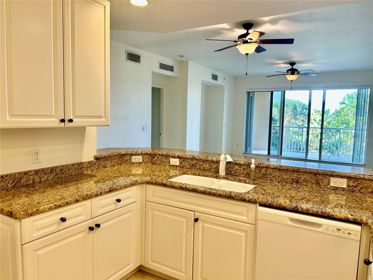 Photo 6 of 20: Kitchen opens to living areas!