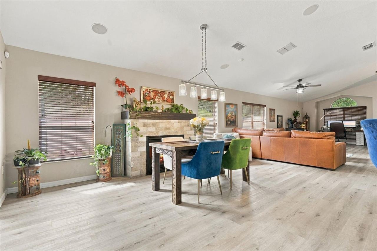 Photo 14 of 20: Dining and main living area. The soaring ceilings provide a spacious feel.