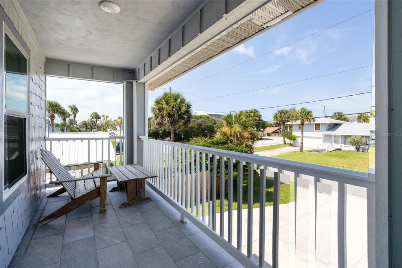 Photo 20 of 20: Spacious tiled front porch/deck, facing East