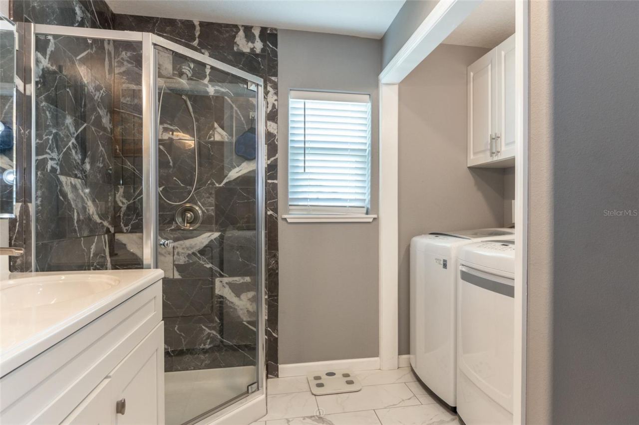 Photo 15 of 20: Full size washer & dryer. Plenty of cabinet space