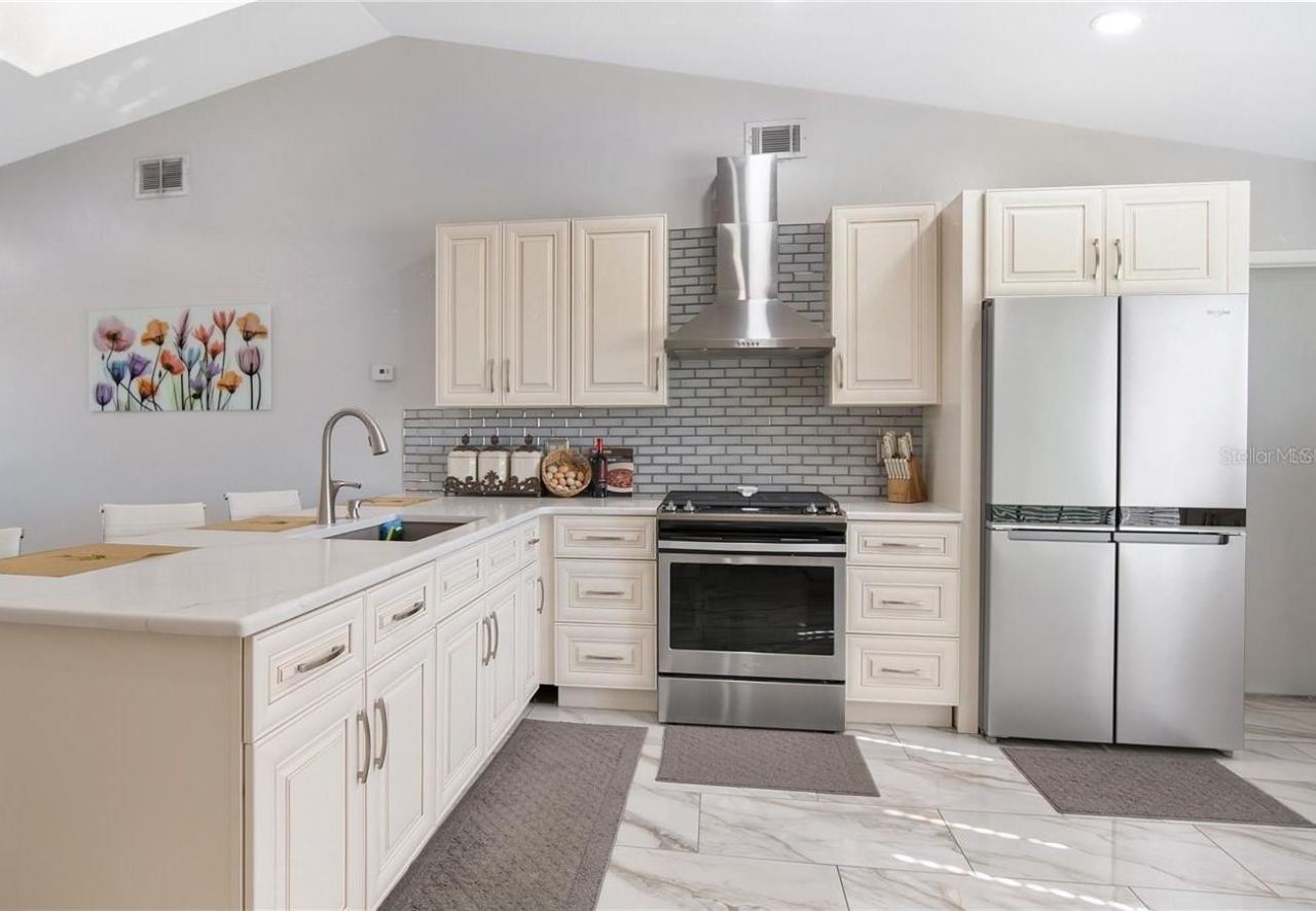 Photo 6 of 18: remodeled kitchen with gas stove