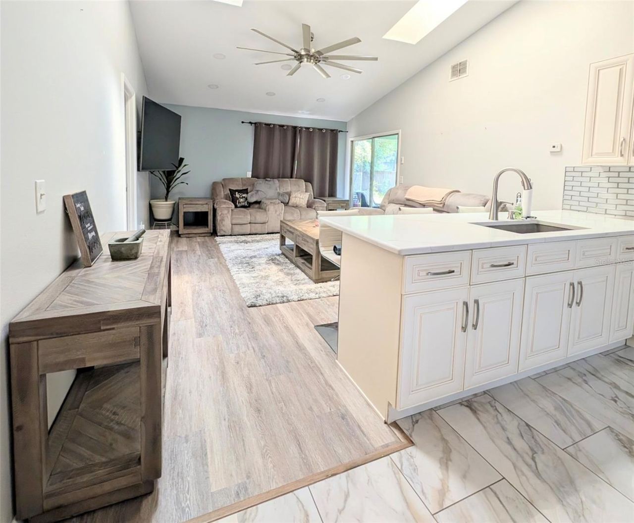 Photo 3 of 18: living room from eat in Kitchen