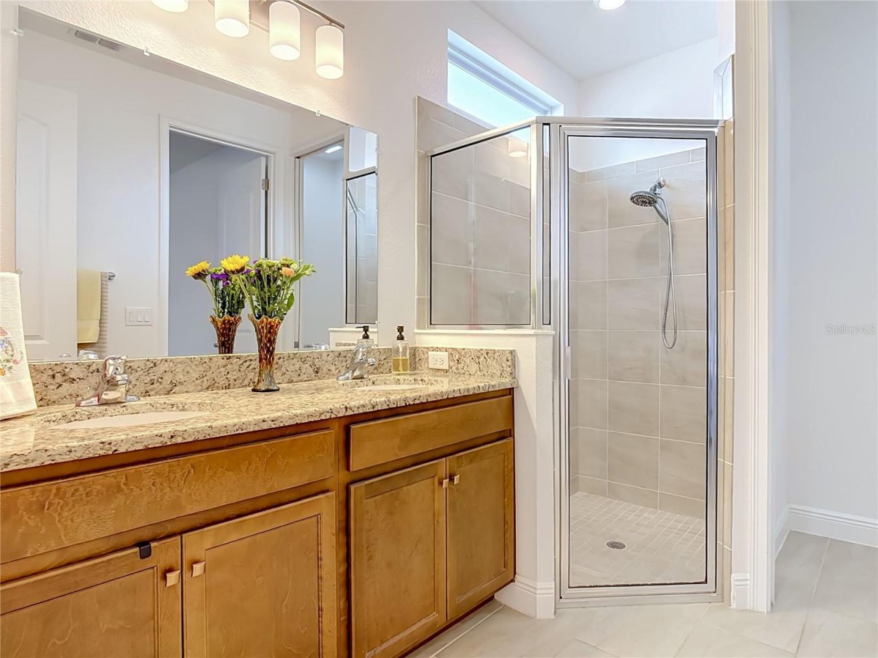 Photo 19 of 20: Primary bath with double sinks
