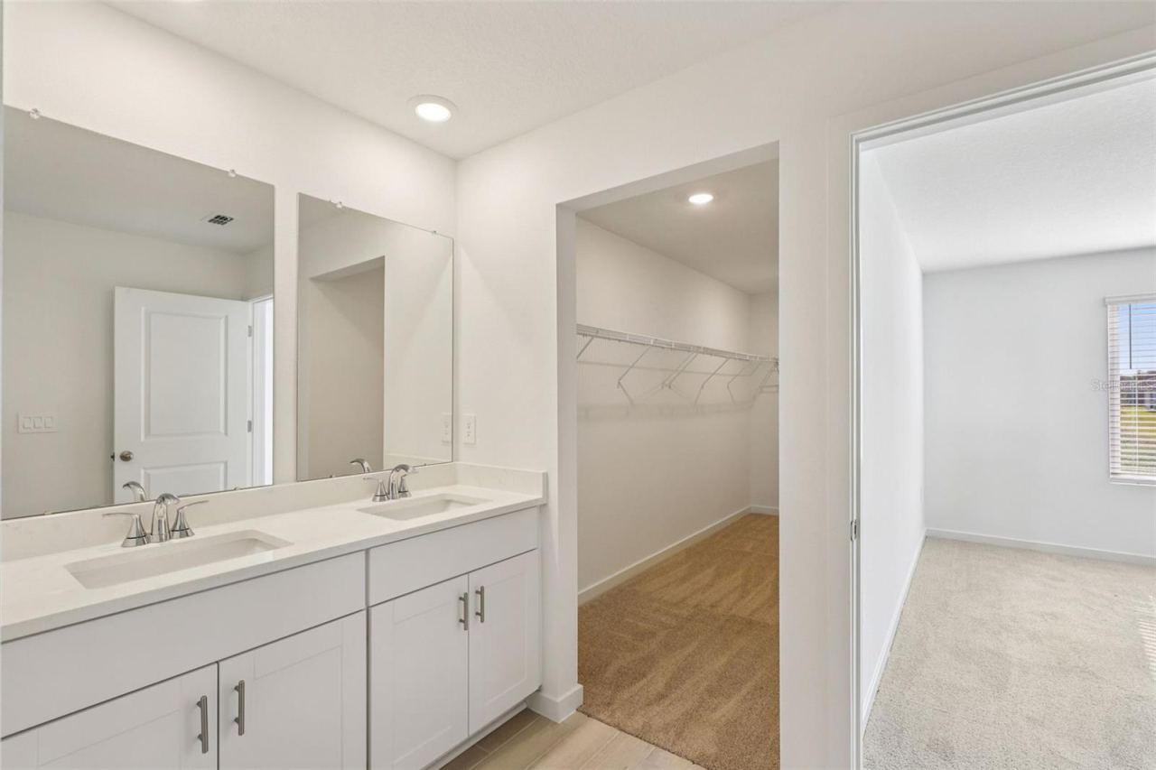 Photo 19 of 20: The interior photos are of another home with the same floor plan but different interior color package finishes. Some details may vary