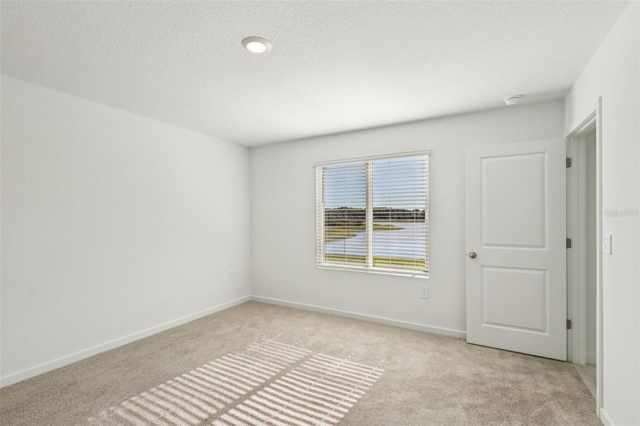 Photo 17 of 20: The interior photos are of another home with the same floor plan but different interior color package finishes. Some details may vary