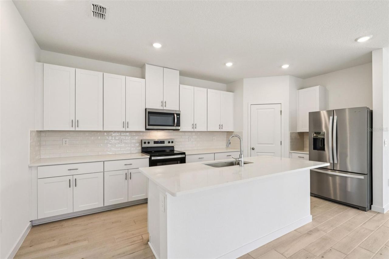 Photo 2 of 20: The interior photos are of another home with the same floor plan but different interior color package finishes. Some details may vary
