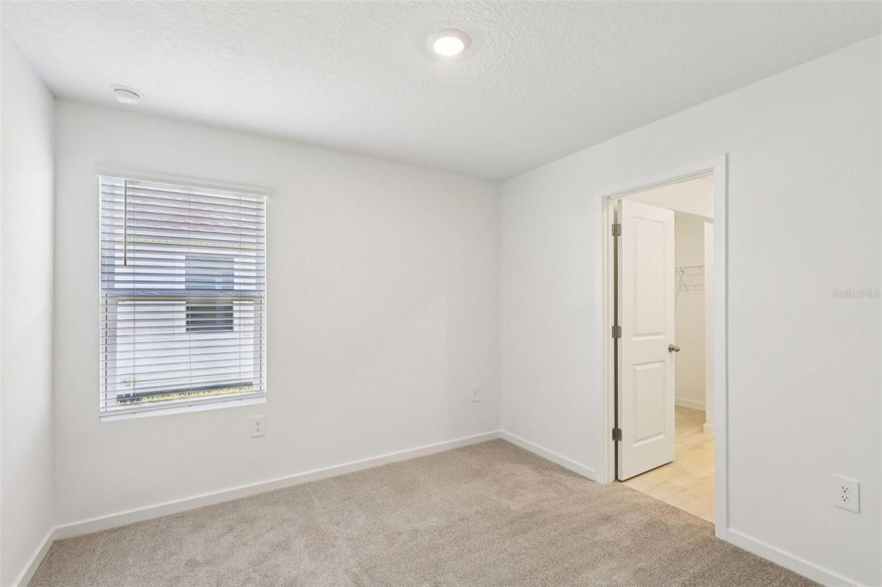 Photo 15 of 20: The interior photos are of another home with the same floor plan but different interior color package finishes. Some details may vary