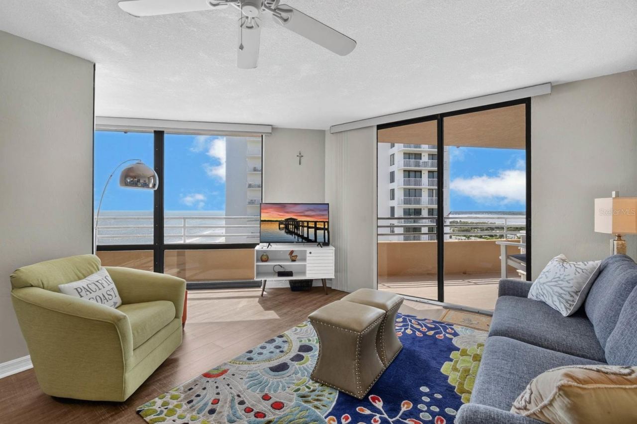 Photo 11 of 20: Living room facing left Ocean and Right Halifax river