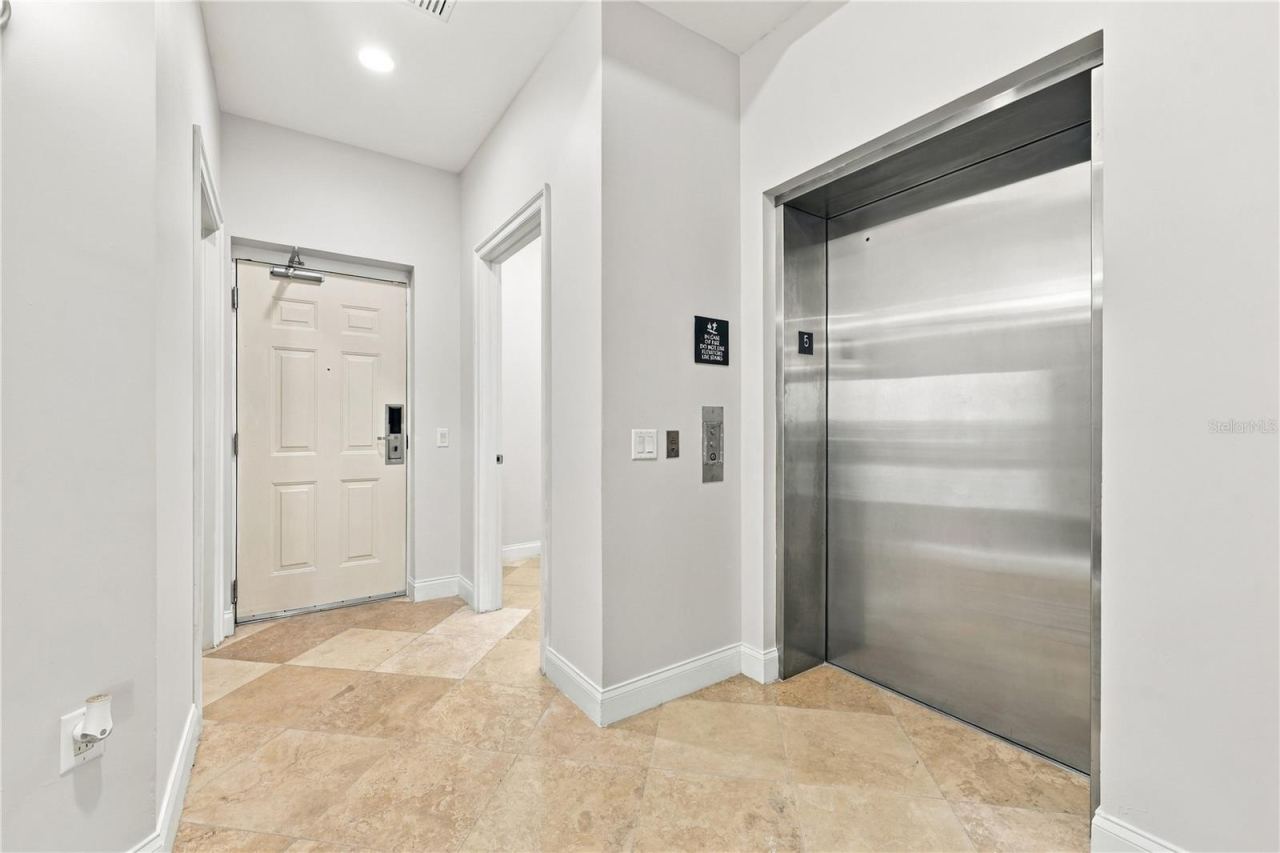 Photo 8 of 20: Private Elevator Entrance into Condo