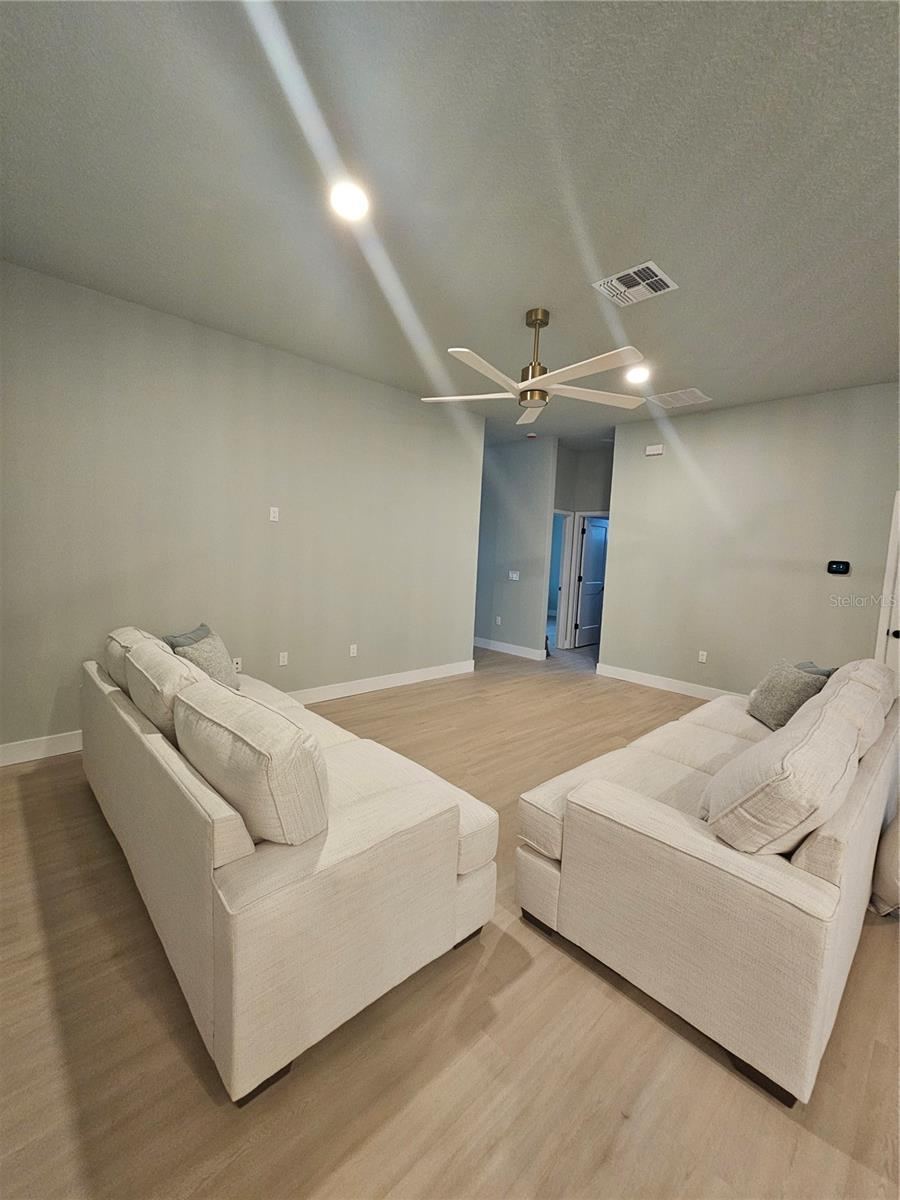 Photo 8 of 20: Great Room - Model Property - Previous Build at Different Location
