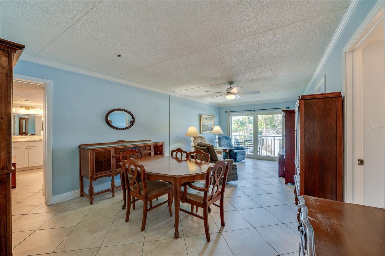 Photo 8 of 20: Dedicated dining space with room for a full table, seamlessly flowing into the living area—ideal for everyday meals or entertaining.