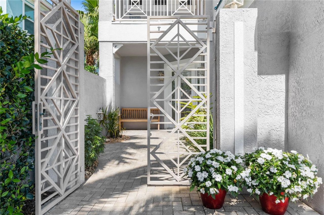 Photo 2 of 20: Gates that lead to front door