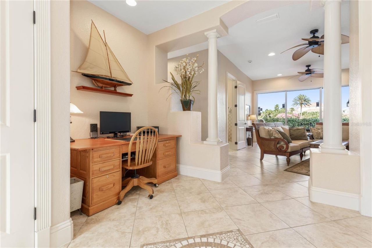 Photo 6 of 20: Front entryway with desk leads to family room
